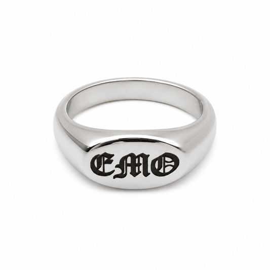 A polished silver signet ring engraved with the gothic-style letters 'EMO' on a clean white background.