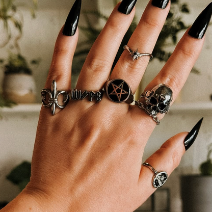 long black nails with gothic rings